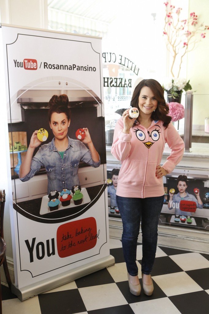 Rosanna Pansino infront of The Youtube Sign at The Little Cupcake Bakeshop Youtube Angry Birds Event